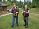 The author and William “Captain Bill” Jones, N0CIC, take down a dipole at the end of 2009 Courage Handiham Radio Camp held at Courage North, Lake George, Minnesota.