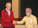 At the banquet Saturday evening, Nick Roethe, DF1FO (left) receives his Region 2 silver medal in the category for men ages 50-59 from Marvin Johnston, KE6HTS. Although Roethe resides in Germany, he competed for IARU Region 2 medals on the Canadian team because that is the country of his birth. [Joe Moell, K0OV, Photo]