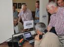 Newly licensed Durmishali Smani, Z61DD (seated), -- with assistance from Bob Barden, MD0CCE/N2BB (on right) -- helped activate Z60K. [Nigel Cawthorne, G3TXF, photo]