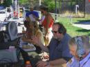 Volunteer operators and loggers make contacts at N9N while visitors look on. The station made more than 2000 contacts during the weekend.