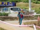 Vadim Afonkin, KB1RLI, nears the 2 meter finish line of the 2008 ARDF World Championships in South Korea, where he won fifth place in his age category during the 80 meter competition. [Jay Hennigan, WB6RDV, Photo]